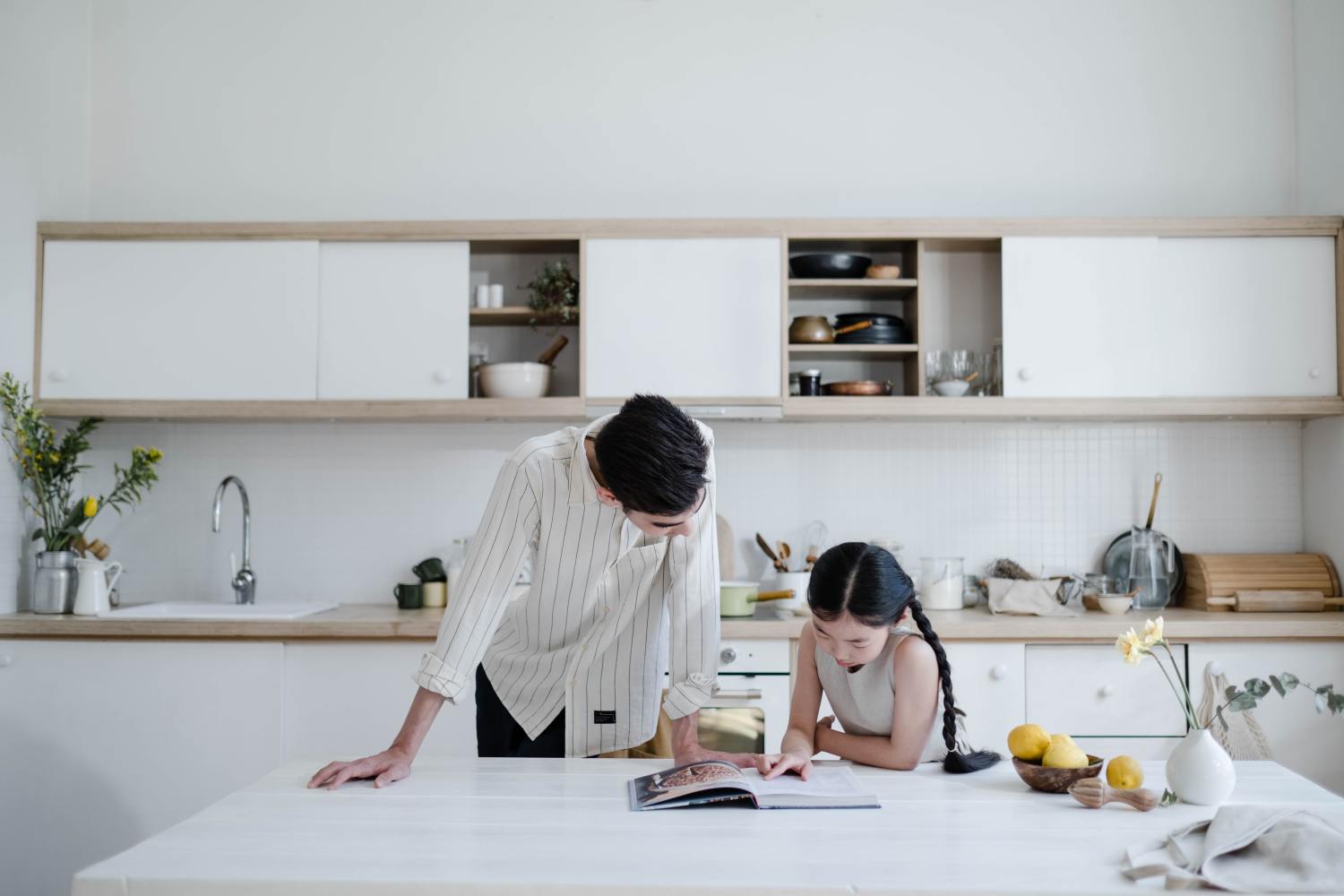 Family cooking while discussing the difference between a deed and title.