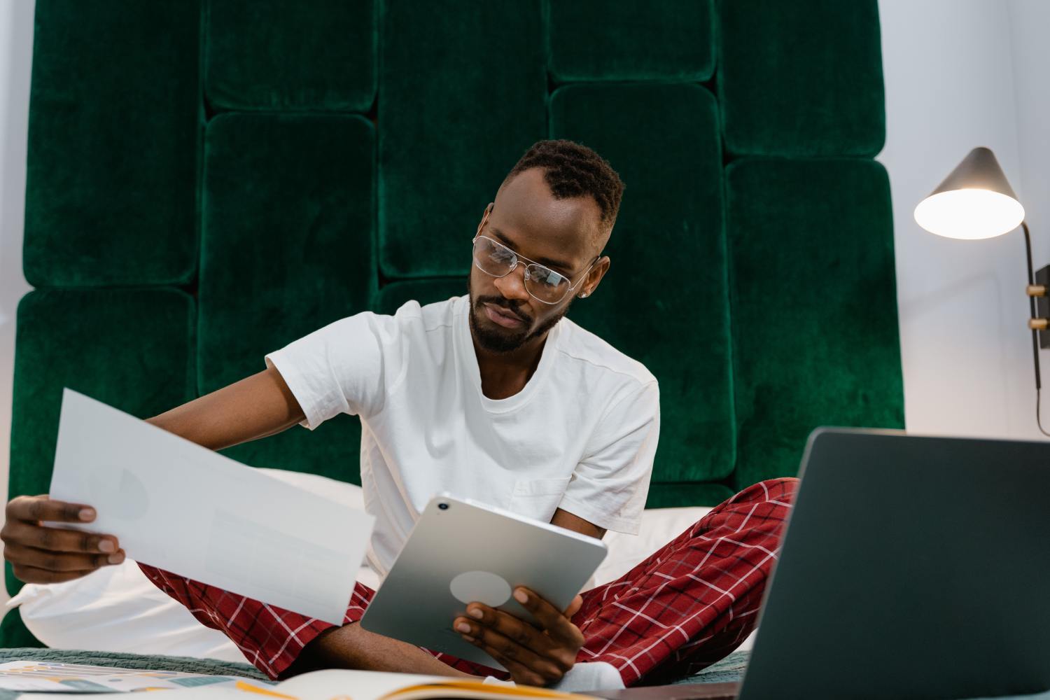 Man in bed researching do I need a lawyer to get a Power of Attorney.