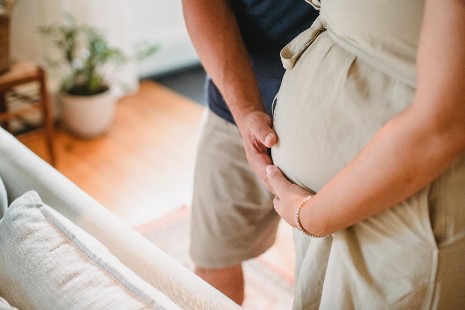 Couple expecting a baby thinking about updating their estate plan.