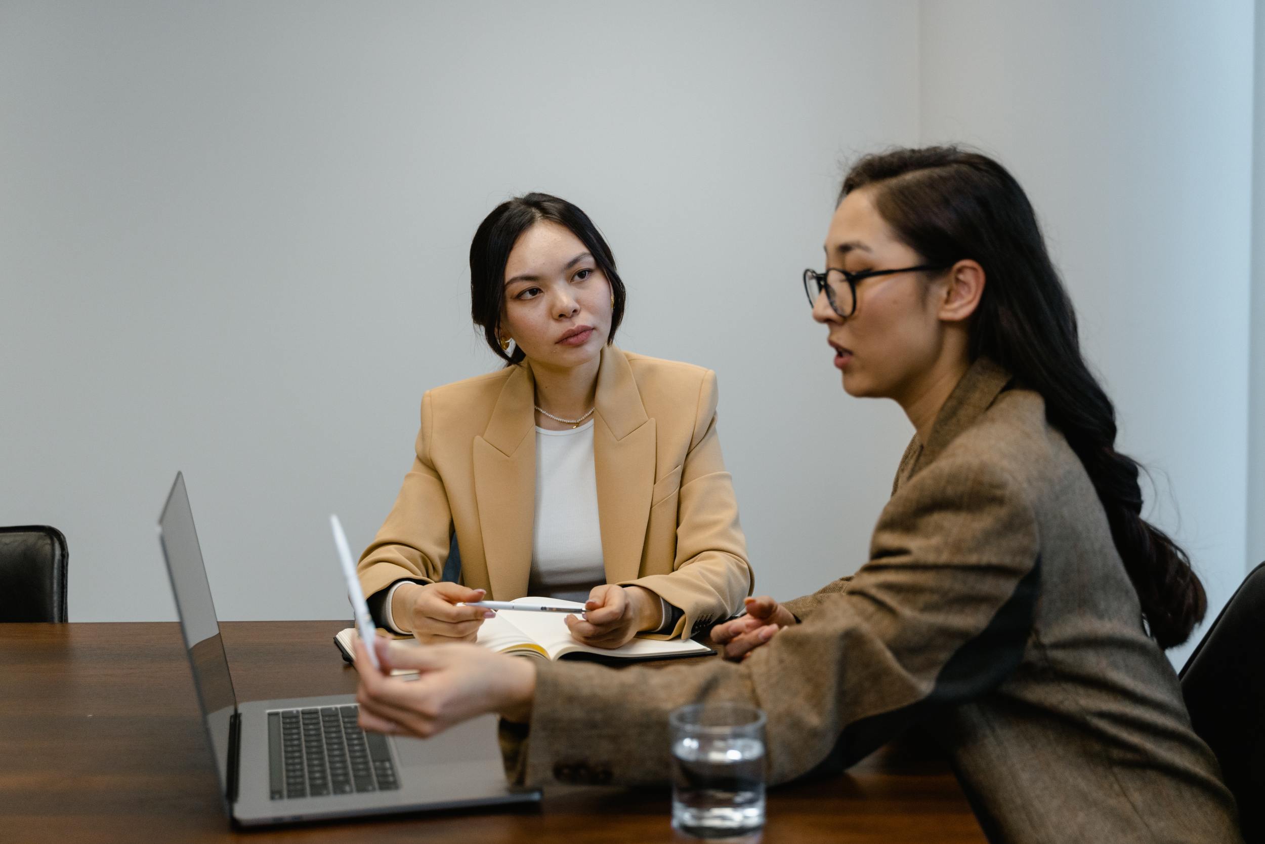 Employees working together after their company implemented employee equity and engagement policies.