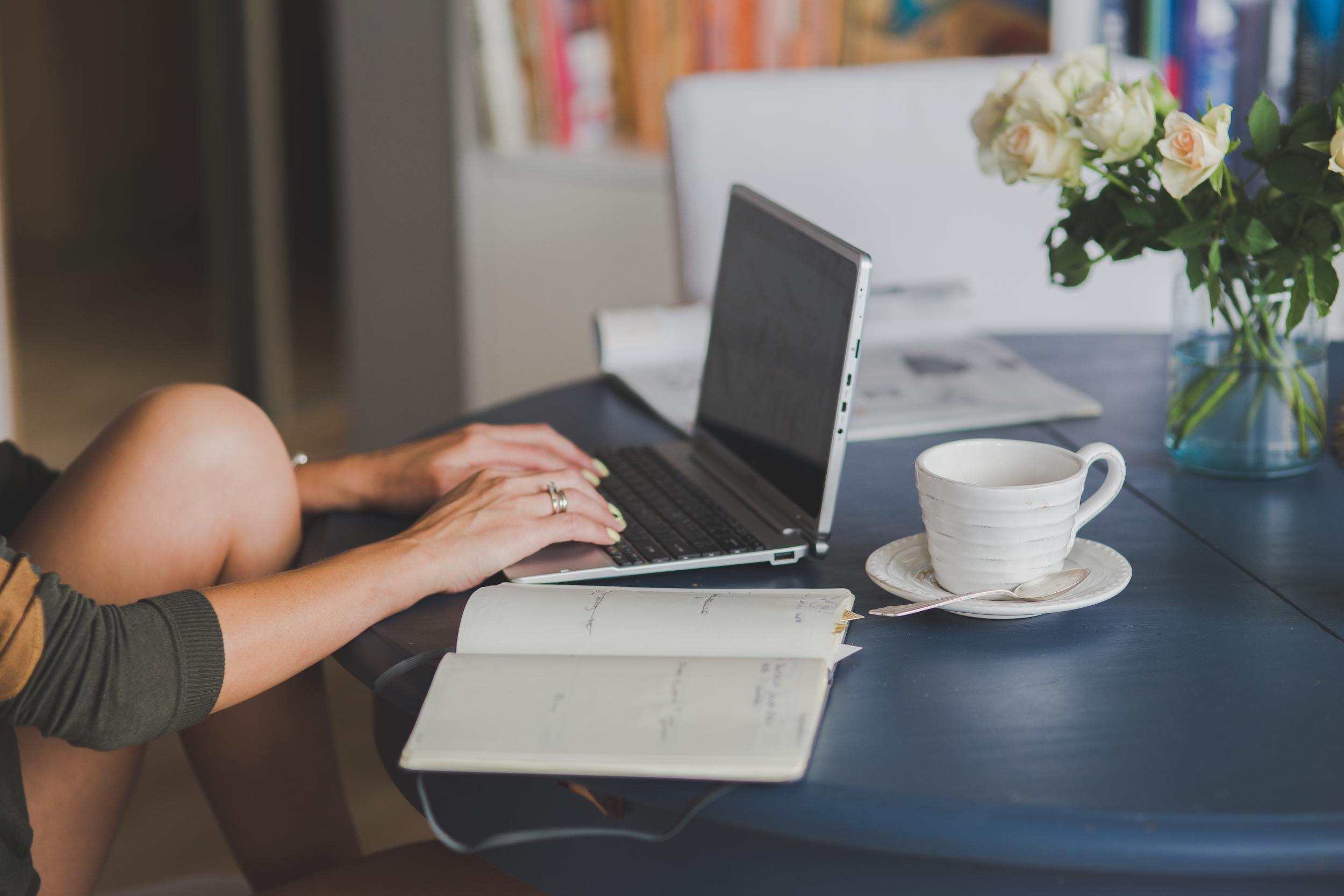 Woman researching on computer about FDIC limits and Trusts