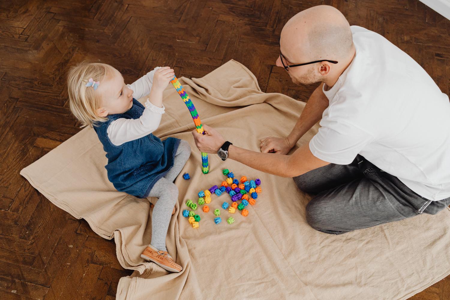 Father with daughter after making a financial planning checklist for 2023.