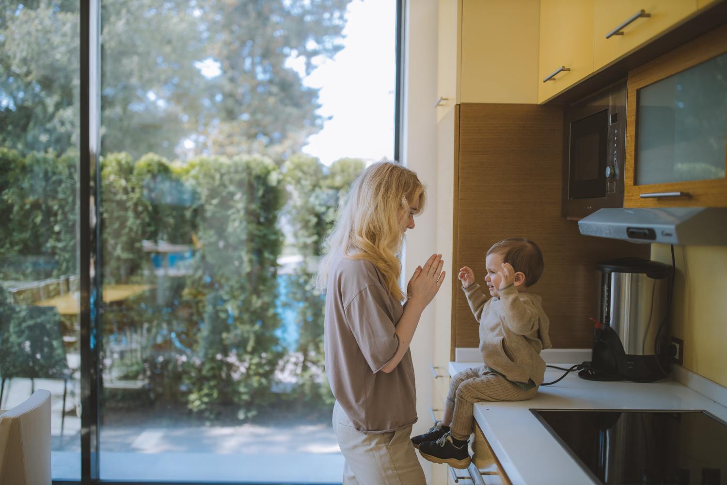 Mother with child after figuring out how much life insurance she needs.