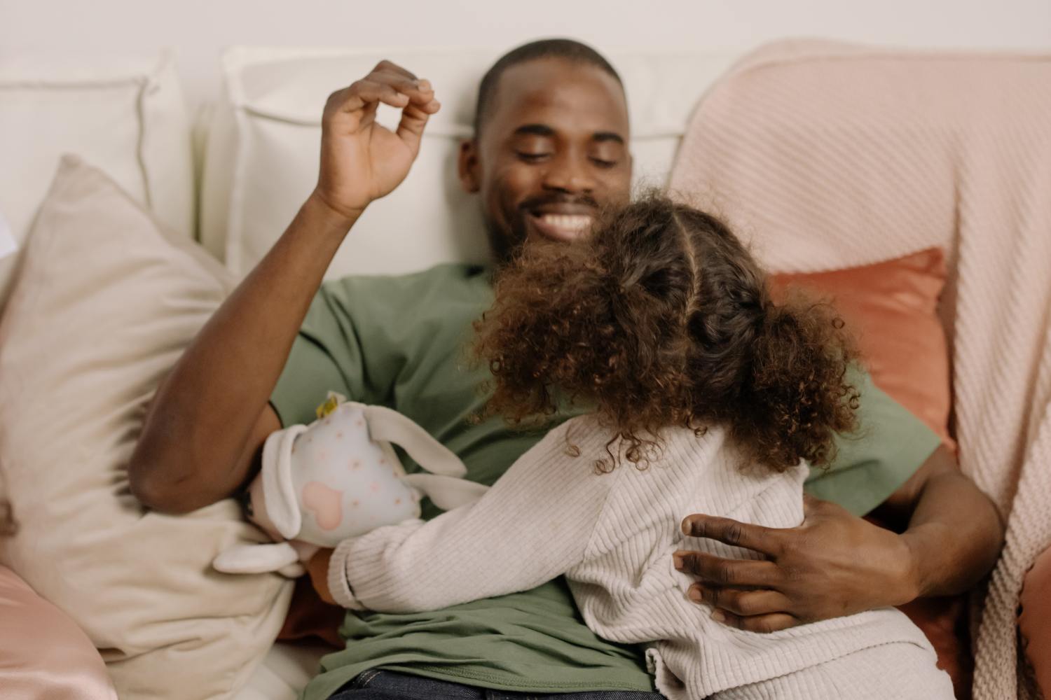 Man hanging out with daughter after figuring out which non-estate planning documents you should have.