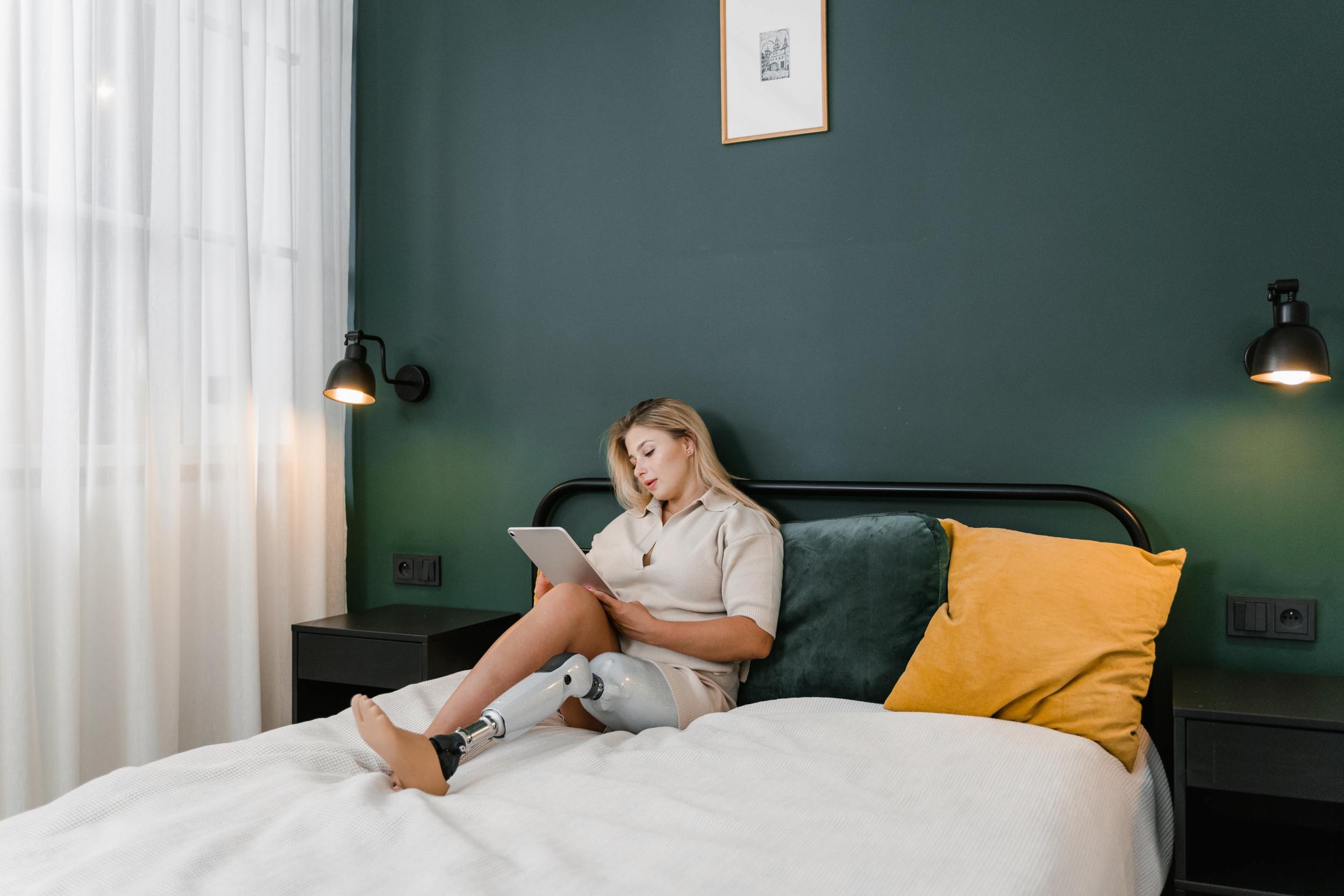 Woman on laptop looking up recession estate planning tips.